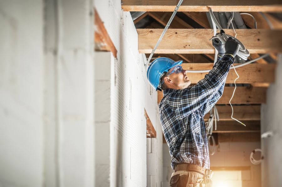 Electrical contractor installing wiring