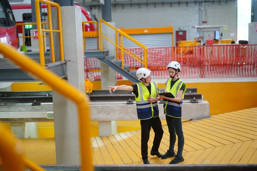 Engineers reviewing facility electrical infrastructure